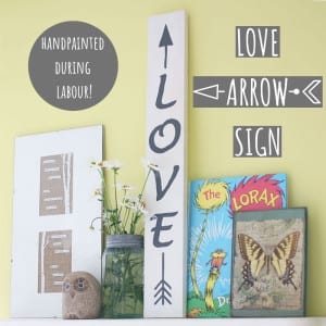 This love arrow sign was handpainted while I was in labour with my second child. Here's how you can make one too! Contractions not required...