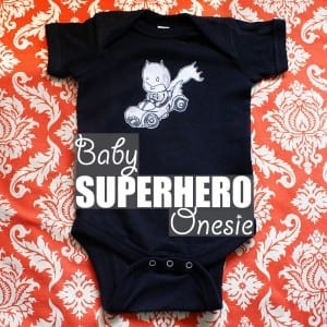 Baby Superhero Onesie by Of Houses and Trees | One-of-a-kind baby superhero onesie featuring baby Batman – hand drawn by the extremely talented Devin Patterson. Next up? A baby Catwoman toddler t-shirt!