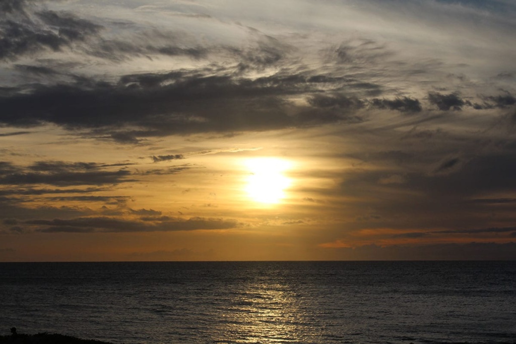 Sunset over the ocean during our Maui family vacation.