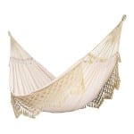 Green outdoor decor item - an organic cotton hammock.