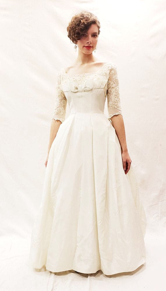 Backyard weddings are one of 10 current Pinterest trends that slant toward a truly inspiring ambition - being more green! Backyard weddings tend to have less of an environmental impact and also involve eco-friendly options like nature-inspired decor and vintage clothing - like this gorgeous 1950s wedding dress!