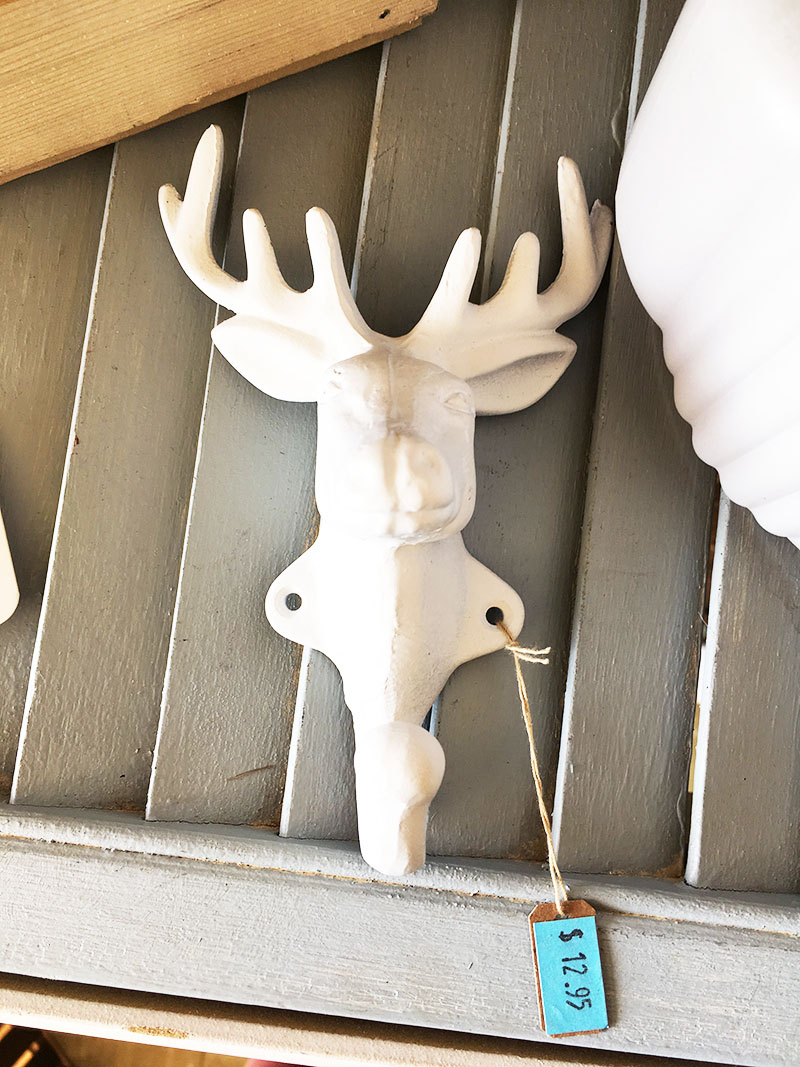 Want to create a unique place to hang your hat? Grab an antique cornice, throw on some metal hooks and you've got yourself a DIY wall mounted coat rack!