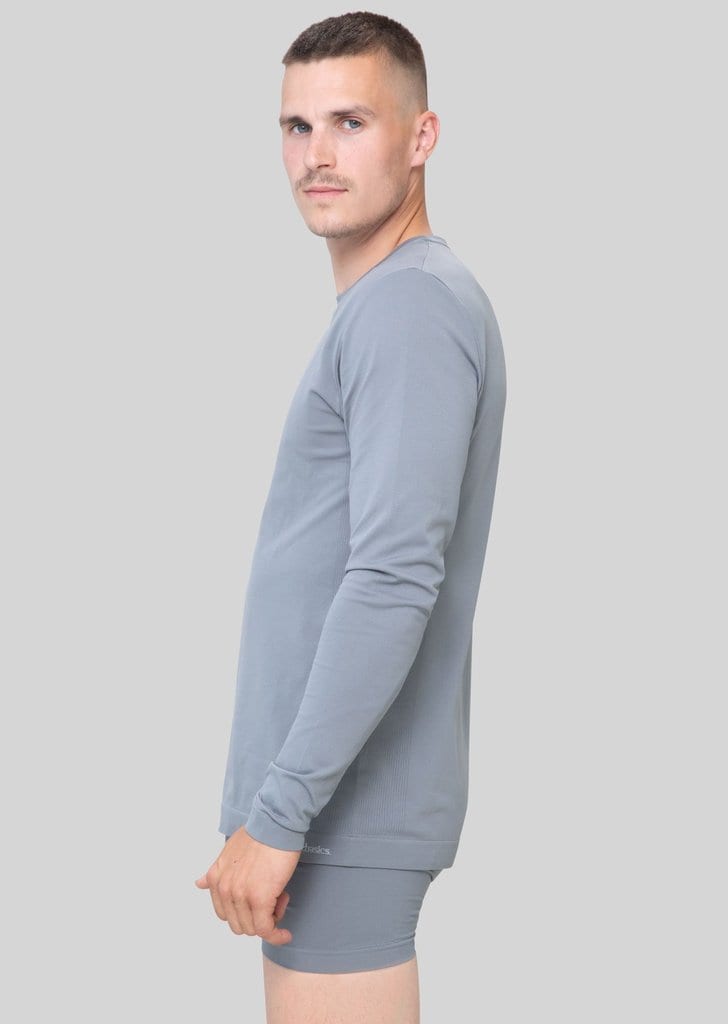 Want to create an eco-friendly laundry practice? Cut down on water use by washing your clothes less often - and invest in high-quality clothing basics. Like this anti-microbial long-sleeve and boxers by Organic Basics. 