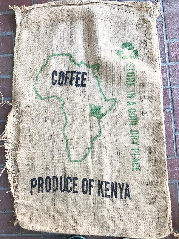 Raise your hand if you love antique home decor. Raised both hands? You've come to the right place! Here's a home tour featuring antique and thrifted finds, plus a list of vintage pieces I found on Etsy - like this old coffee sack.