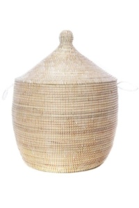 Love the look of bohemian bedroom decor, but need a little guidance pulling it all together? Check out this boho bedroom shopping guide - featuring eco-conscious items like this handmade grass basket from ethical marketplace Made Trade.