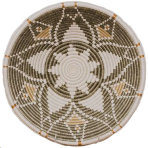 Love the look of bohemian bedroom decor, but need a little guidance pulling it all together? Check out this boho bedroom shopping guide - featuring eco-conscious items like this handwoven wall bowl from ethical marketplace Made Trade.