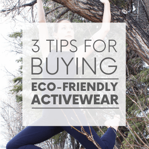 Larissa hanging from a tree wearing a black unitard with the words "3 tips for buying eco-friendly activewear." Click to visit post.