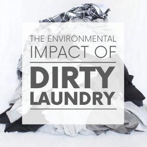 A pile of white, black and grey laundry with the words "the environmental impact of dirty laundry." Click to visit post.