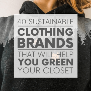 A woman wearing a black and grey hoodie with trees on it with the words "40 sustainable clothing brands that will help you green your closet." Click to visit post.