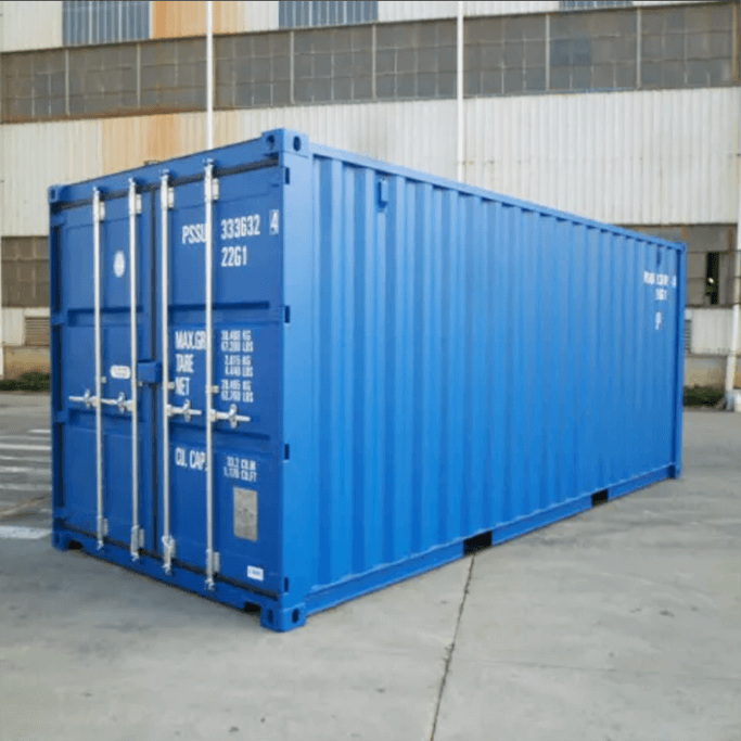 A bright blue shipping container in a large warehouse.