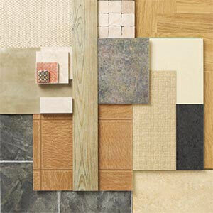 Various flooring materials arranged in a pile.