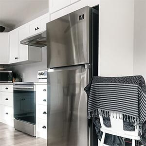 white apartment fridge