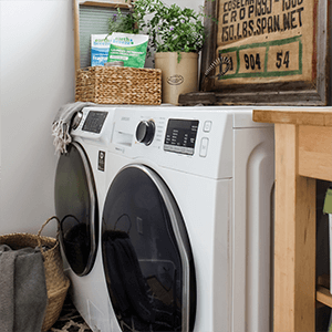 A simple laundry room with vintage decor.
