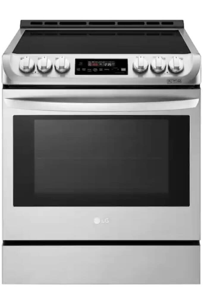 Stainless steel and black LG range on a white background.