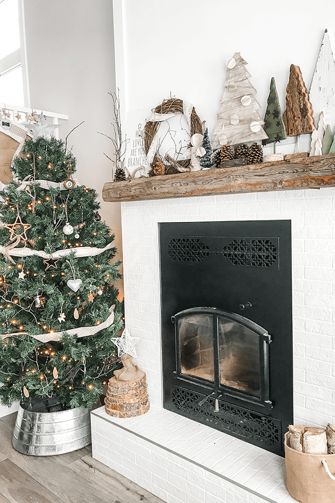 A bright living room with rustic Christmas decor.