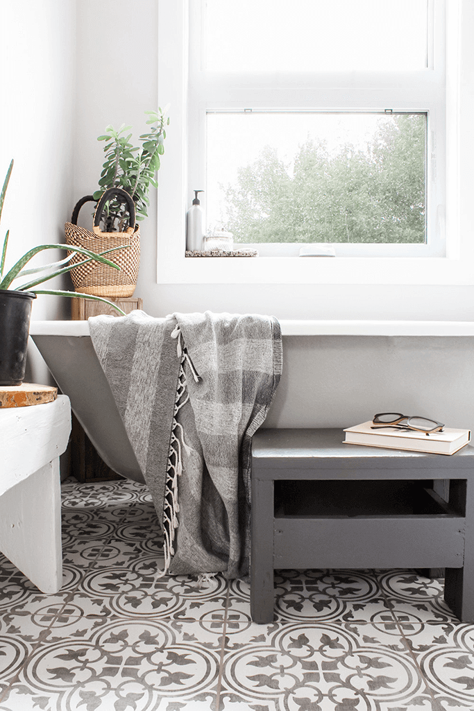 A bright bathroom with antique and vintage decor.